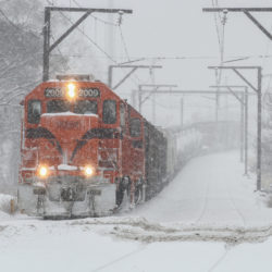 Image of CSS 2009 train traveling through snow