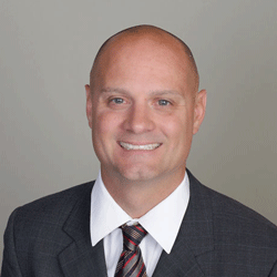 Headshot of Quentin Schulte, president of Northern Lines Railway
